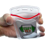 A hand holding a transparent plastic ID badge holder with a red top edge, containing a card with a shield logo and the text "SPECIALIST ID INC." showcases our Custom Heavy Duty Vinyl Vertical Badge Holder w/ Resealable Zip Top (1815-1110), designed for personalized identification accessories.