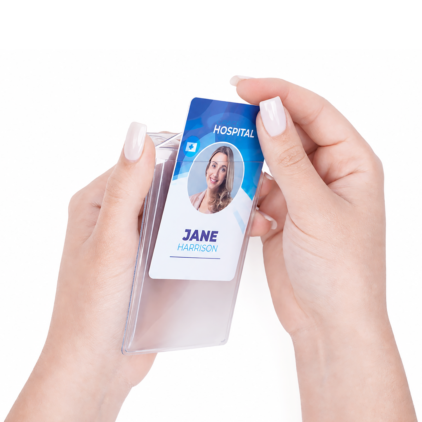 A person inserts a hospital ID badge with the name "Jane Harrison" and photo into a Vinyl Vertical Badge Holder with Flap (506-24FS).