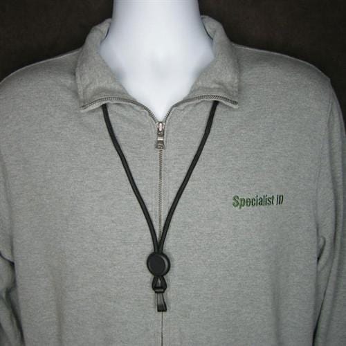 Close-up of a gray pullover with a zipper and "Specialist ID" embroidered on the left side, featuring a Custom Heavy Duty "No-Twist" Breakaway Black Lanyard with Slider (FF-34H-BLK) around the neck to enhance brand awareness.