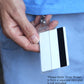 A person holds a Vertical Half Card Holder for Magnetic Stripe Swipe Cards - Heavy Duty Gripper (SPID-1380) with a black magnetic stripe swipe card, attached to a retractable strap. Note in the image: "Strap shown is from a separate item and is not included." Ideal for professional purchasers looking for secure identification solutions.