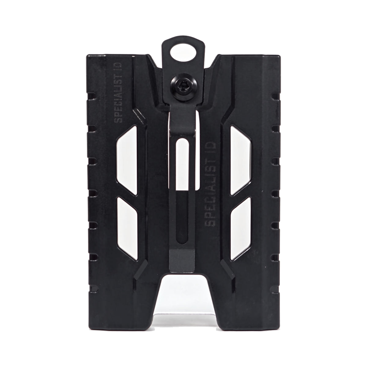 Back view of the black TEST-123 rigid vertical ID badge holder, showing the metal spring belt clip down the center, the thumb cutouts and the Specialist ID name molded into the side rails.
