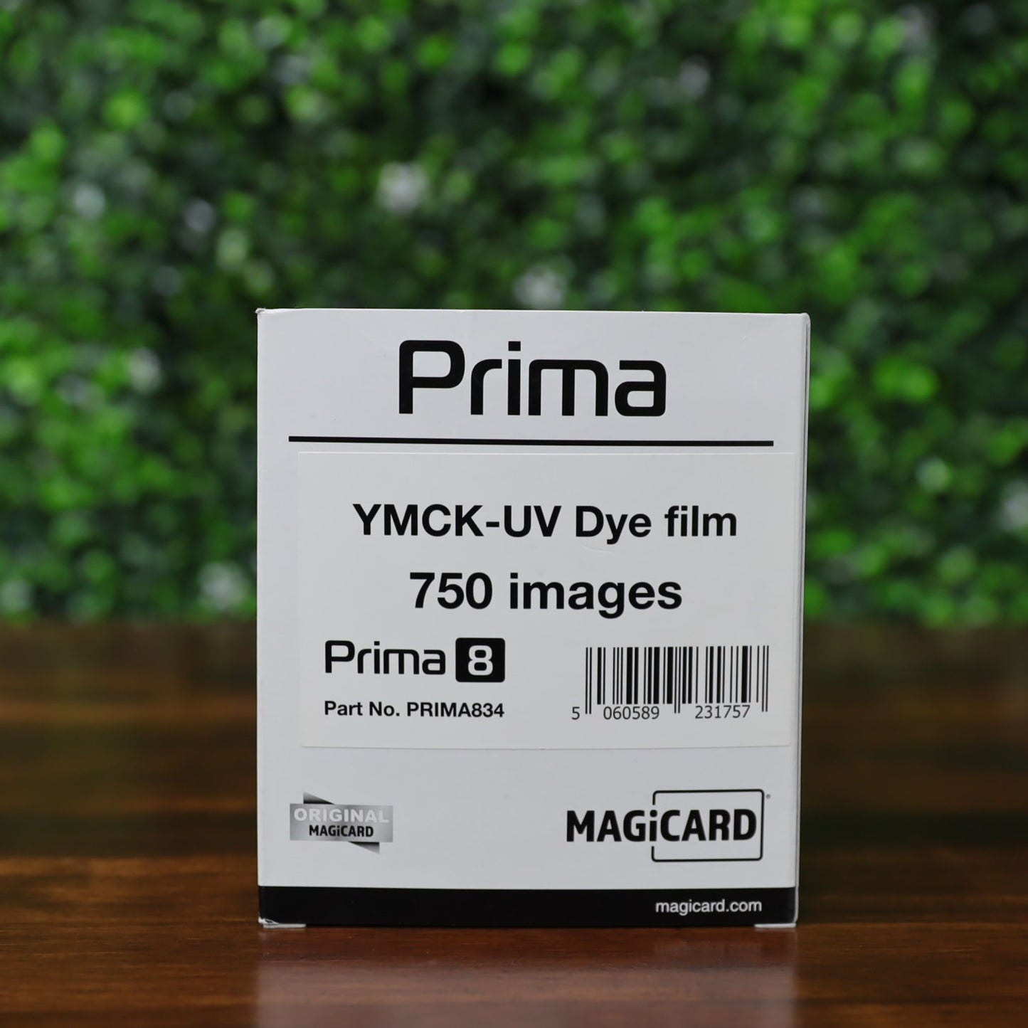 Front of Magicard Prima834 YMCK-UV Dye Film box showing part number, 750 image yield, barcode, and Magicard branding. Photographed and sold by Specialist ID, an authorized Magicard Dealer.
