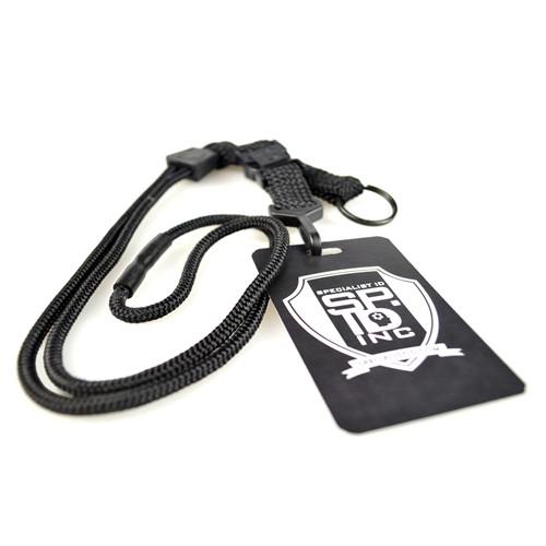 A Black EK Breakaway Lanyard with Detachable ID Hook And Key Ring (10230) by EK USA, featuring a logo with the text "Specialist ID," offers both style and safety, easy to use for quick release.