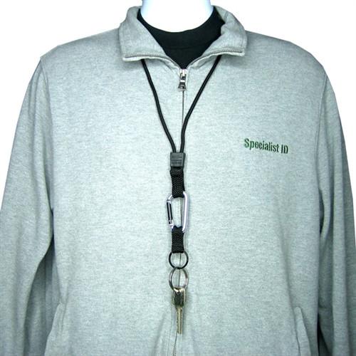 Close-up of a person wearing a grey Specialist ID sweatshirt and an adjustable clinch Black EK Lanyard With Carabiner (10384) by EK USA around their neck, holding keys and a carabiner. The person's face is not visible.