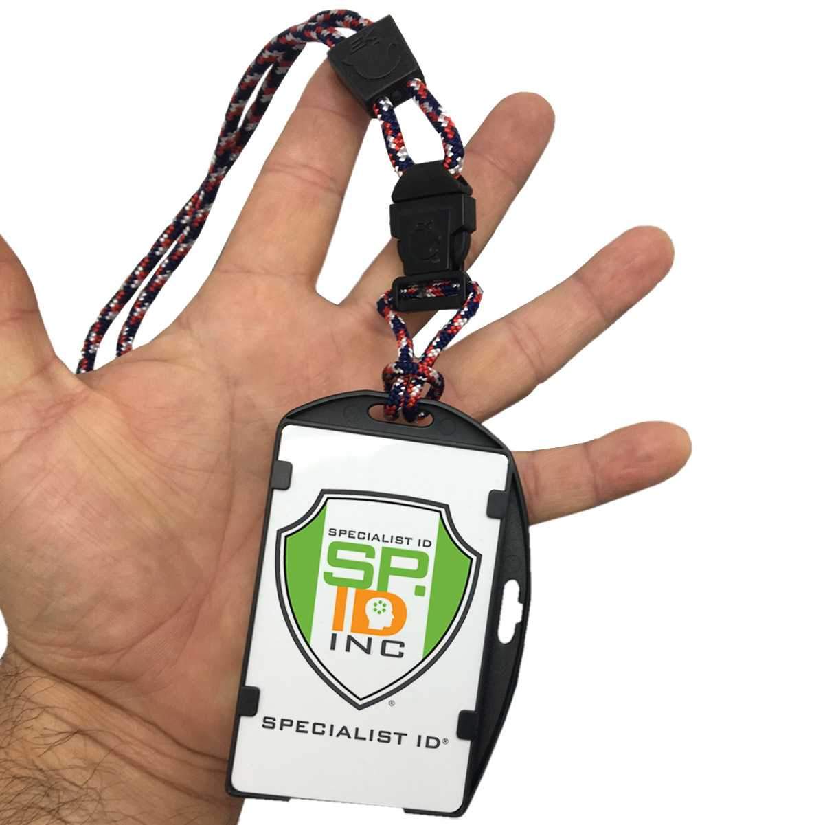 A hand holds an EK USA RFID Blocking Dual Sided Badge Holder with Heavy Duty Breakaway / Quick Release Lanyard (10943) by EK USA. The dual-sided badge holder displays the Specialist ID logo prominently.