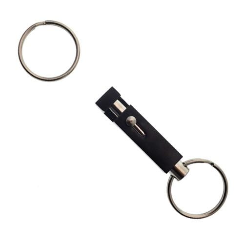 A detachable keychain, known as the Key-Bak #1101 Quick Release Pull-Apart Key Ring, features two metal key rings connected by a black rectangular connector, allowing you to easily organize keys and separate vehicle and house keys when needed.