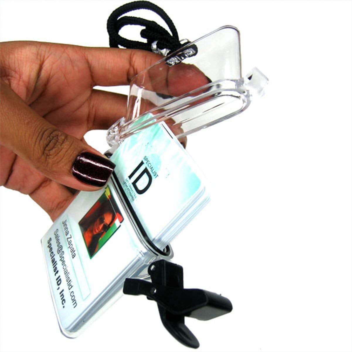 A hand with dark nail polish holds a Multi-Card Clear Rigid Water Resistant Holder (1840-9000/WPH-1) displaying an ID card, attached to a black lanyard.