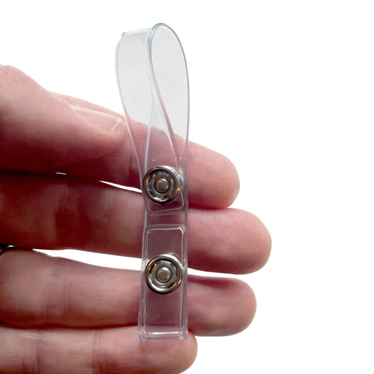 Hand holding 505-M clear vinyl badge strap clip