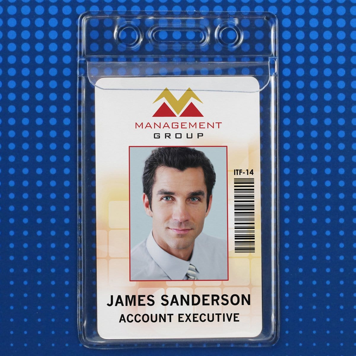 Employee ID card for James Sanderson, Account Executive at Management Group, securely housed in a Vinyl Vertical Badge Holder with Flap (506-24FS) featuring his photo, barcode, and identification number ITF-14.