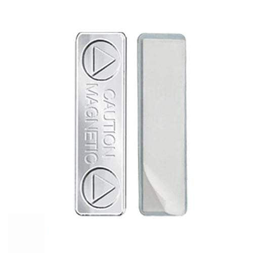 Two rectangular Magnetic ID Badge Holder Sticky Back (P/N 5730-3000), one showing the "Caution Magnetic" engraving and the other displaying the adhesive side. Both are positioned vertically.