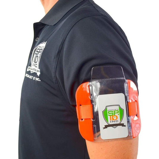 Orange armband ID badge holder worn on upper arm