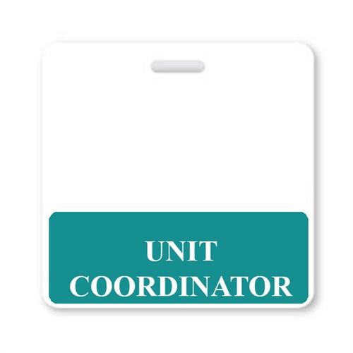 A fully laminated "UNIT COORDINATOR" Horizontal Badge Buddy with Teal border, featuring a green section at the bottom displaying "UNIT COORDINATOR" in white capital letters. This horizontal badge buddy has a slot at the top for attaching to a holder or lanyard.