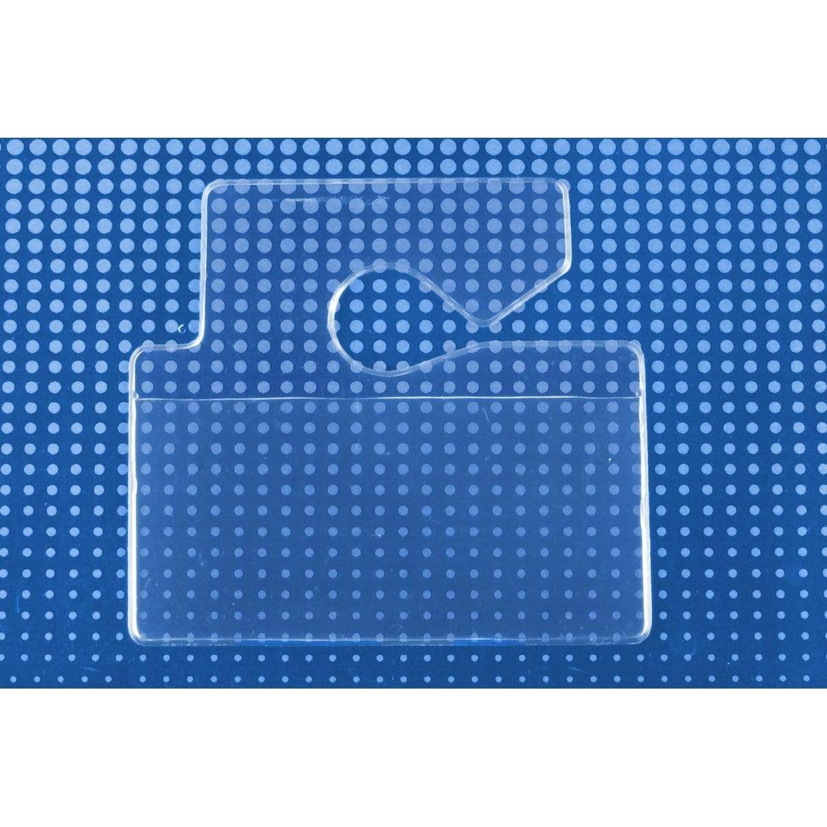 Rectangular transparent plastic card holder with a cutout slot on a blue dotted background, ideal as a Clear Rigid Vinyl Horizontal Parking Pass Vehicle Hang Tag Holder (1840-3650).