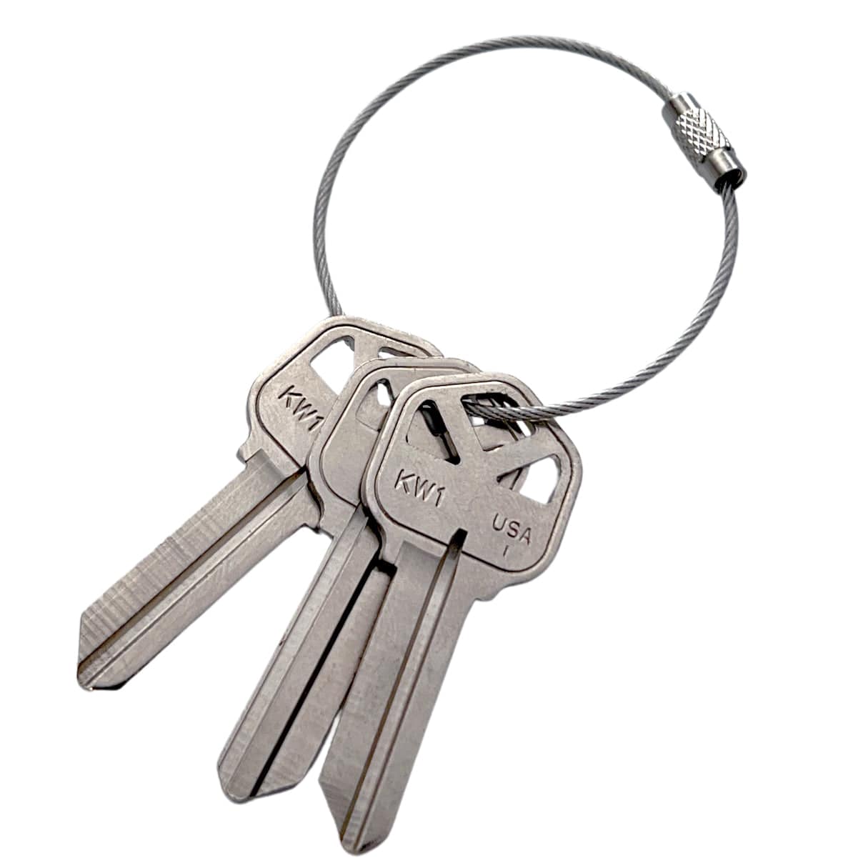 Three silver keys on a Wire Loop Luggage Tag Holder - 6 inch Metal Stainless Steel Cable Ring Connector for Keys or Luggage Tags.