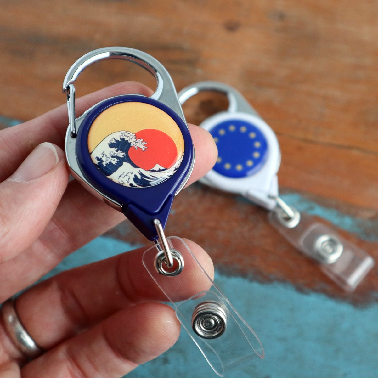 Two designs on carabiner reels, straight off the bench