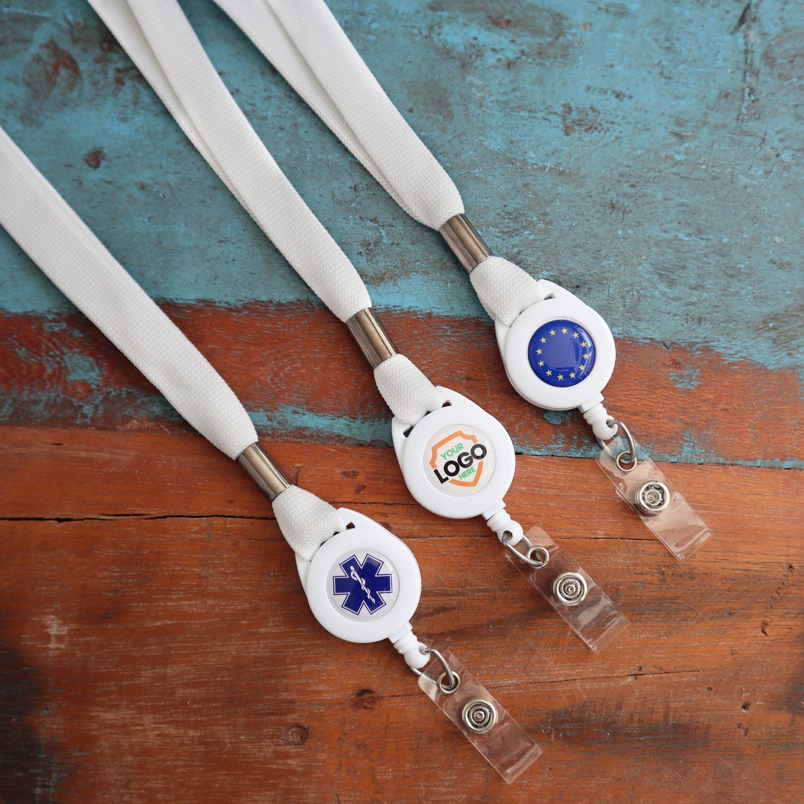 EMS star on white reels and lanyards