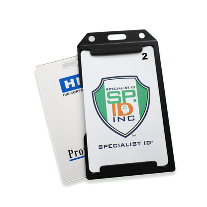 The 2 Sided Rigid Vertical MultiCard Badge Holder (1840-308X) securely displays two ID cards—one with a "SPECIALIST ID INC" logo and another partially visible—both featuring slot holes for easy lanyard attachment.