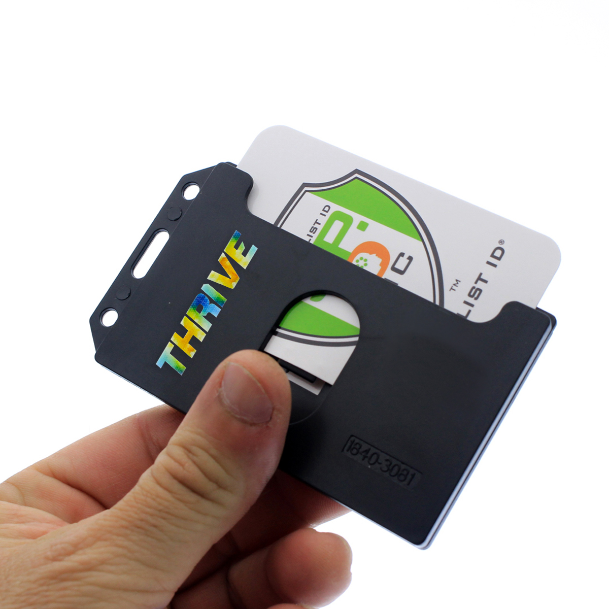 A hand holds a black plastic card holder with the text "THRIVE," displaying a white card partially inserted with a green shield logo, providing a professional look and customizable badge holder option: Custom 2-Sided Rigid Vertical Multi-Card Holder (1840-308X) - Add Your Logo.