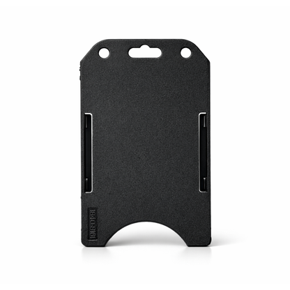 The Vertical Open Face Plastic ID Holder (1840-816X) is a durable black plastic badge holder with a rectangular shape, featuring two side slots, a semicircular cutout at the bottom for easy card access, and two holes at the top for attaching a lanyard or clip. This vertical card holder ensures convenient display and quick access to your credentials.