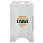 Transparent vertical plastic card holder with three punch holes at the top and two side slits for securing a card. The front displays a shield logo with "YOUR LOGO HERE" text, perfect for personalized badge accessories or custom ID badge holders. Custom Vertical Open Faced Plastic ID Badge Holder (1840-816X) - Upload Your Logo.