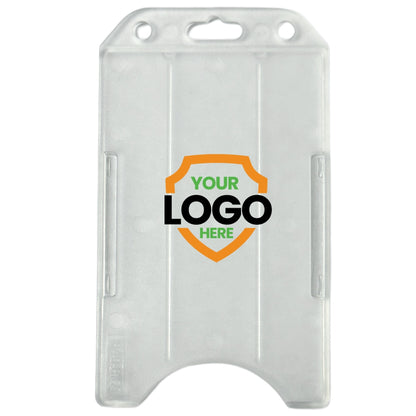Transparent vertical plastic card holder with three punch holes at the top and two side slits for securing a card. The front displays a shield logo with "YOUR LOGO HERE" text, perfect for personalized badge accessories or custom ID badge holders. Custom Vertical Open Faced Plastic ID Badge Holder (1840-816X) - Upload Your Logo.