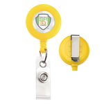 A yellow Custom Printed Retractable Badge Reels With Belt Clip - Personalize with Your Brand Logo with a plastic clip attachment and a metal clip on the back. The front features a circular badge with the SP19 INC logo, showcasing text and a shield design in full color graphics. Custom badge reels like these are perfect for enhancing brand awareness. The image shows both the front and back of the badge reel.