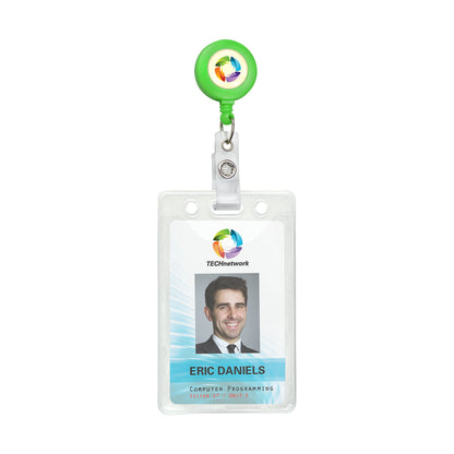 ID badge with a photo, labeled "Eric Daniels" from "TECHnetwork," specifying "Computer Programming." The badge, featuring a brand logo, is attached to a Neon Custom Badge Reel With Belt Clip (P/N 2120-308X) - Add Your Logo.