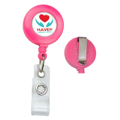 A Neon Custom Badge Reel With Belt Clip (P/N 2120-308X) - Add Your Logo with a clip and a white strap attachment. The custom badge reel features the logo of Haven Medical Center with a red heart and blue symbol below it, making it perfect for promotional staff.