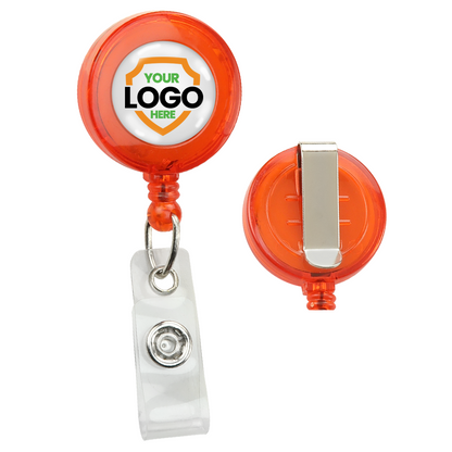 Two orange Translucent Custom Retractable Badge Reels With Belt Clip (2120-360X), one showing the front with "Your Logo Here" and the other showing the back with a metal belt clip. These retractable badge reels are perfect to promote brand awareness.