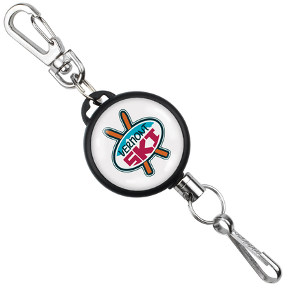 A Custom Retractable Ski Pass Holder - Heavy Duty Sport Reel (2120-4101) - Add Your Logo with a carabiner clip and a key ring. The holder features a logo with text that reads "VENOM SKI." These customizable retractable ski pass holders make perfect promotional items for ski resorts.