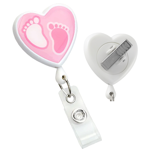 A Custom Heart Shaped Badge Reel With Rotating Spring Clip - Personalize with Your Logo that is perfect for promoting brand awareness. It features a retractable cord and a metal clip on the back for easy attachment.