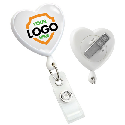 Two Custom Heart Shaped Badge Reels With Rotating Spring Clip - Personalize with Your Logo, featuring a metal clip on the back. One reel has "Your Logo Here" inside an orange shield on the front, perfect to promote brand awareness. Clear retractable clips are attached to both for convenience.