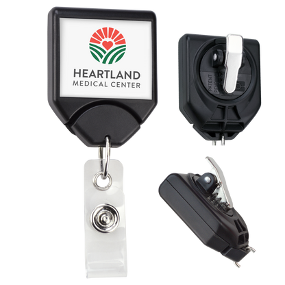 A Custom Printed B-REEL Retractable Badge Reel with Saw-Toothed Swivel-clip labeled "Heartland Medical Center" promotes brand awareness. The retractable holder is black with a rectangular face and metal clip. Three perspectives are shown: front, back, and side.