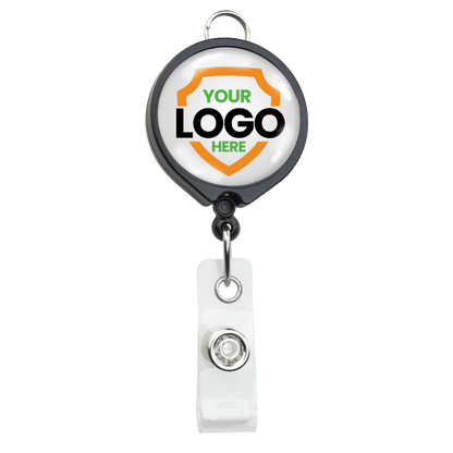 A Custom Badge Reel with Belt Clip and Lanyard Attachment - Add Your Logo, featuring a shield emblem and the text "YOUR LOGO HERE" in the center. Perfect for custom badge reels, it enhances brand awareness with its personalized graphic.