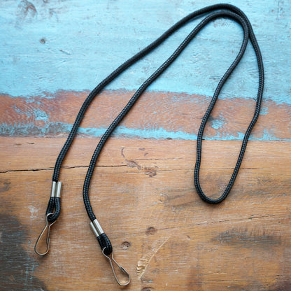 A long black Round Special Event Lanyard with Two Clips 2140-5801 on each end, perfect for securing items like keys or ID badges. Sold by Specialist ID.