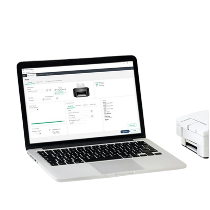 A laptop with ID-ALL ID Card Software – Professional Design & Print for Windows & Mac is next to a small white printer on a white background, ready for efficient card printing tasks.