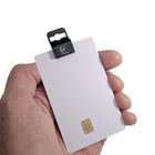 A hand holds a Custom Printed Gripper 30 Card Clamp (5710-305X) - Brand it! with a small black clip attached to its top edge, perfect for brand awareness promotion. Sold by Specialist ID.