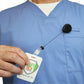 A person in blue scrubs holds an ID badge attached to a Premium No Twist Badge Reel with Swivel Spring Clip - Teardrop Shape (609-I-BLK) on their chest pocket.