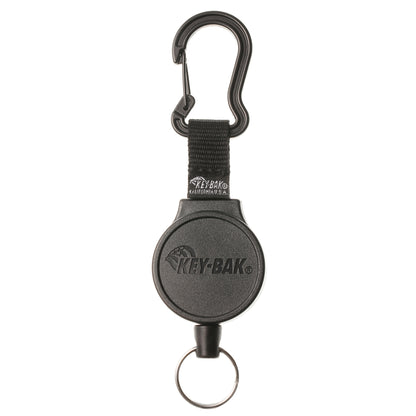 A Key-Bak Mid Size Carabiner Badge Reel with Key Ring (6C) with a black retractable reel and a carabiner clip, featuring a Key-Bak logo on the circular body and a key ring attached at the bottom.