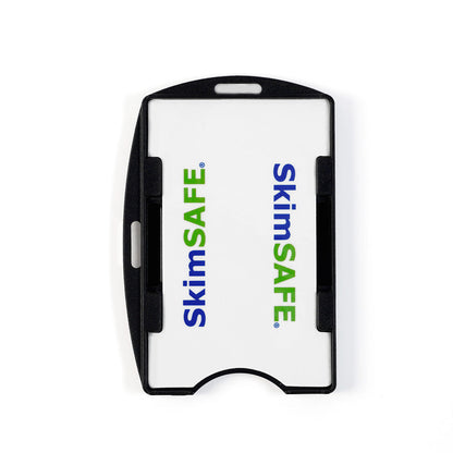 The SkimSAFE RFID Blocking 2-Card ID Holder (AH-210 / 153039) is a black plastic card holder featuring a white card inside printed with “SkimSAFE” in blue and green text, displayed against a plain white background.