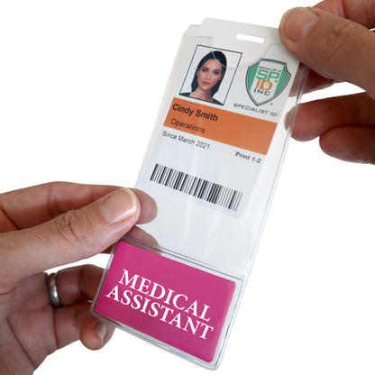 A person proudly displays their Medical Assistant ID in a sleek MEDICAL ASSISTANT BadgeBottom Badge Holder & Badge Buddy in One. It securely holds their photo, name, department, and start date.