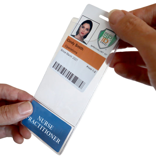 Hands elegantly hold the NURSE PRACTITIONER BadgeBottom, featuring a durable composite vertical ID sleeve with a bottom role tag, showcasing an ID card labeled "Cindy-Smith, Operations, Since March 2021," complete with a photo and barcode, emphasizing professionalism and longevity.