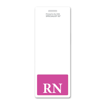 The RN Registered Nurse XL Badge Buddy - Oversized Vertical Hospital ID Role Identifier features a white vertical badge with a pink rectangle at the bottom displaying large white "RN" letters, making it an ideal RN badge buddy for nurse role recognition; the top reads "Printed in the USA SPECIALIST ID.