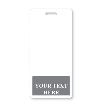 Vertical rectangular badge with a cutout hole at the top for a lanyard, and a gray section at the bottom labeled "YOUR TEXT HERE". Ideal as an Identification tool, this Fully Customizable Badge Buddy Vertical - (Standard Size) enhances your badge holders' professional look.