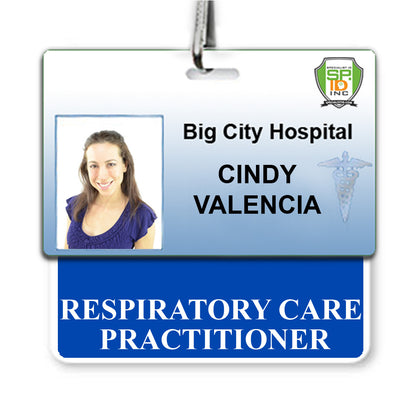 ID badge displaying a photo of a woman with the text "Big City Hospital, Cindy Valencia, Respiratory Care Practitioner," serves as her RESPIRATORY CARE PRACTITIONER Horizontal Badge Buddy with Blue Border in the busy hospital setting.