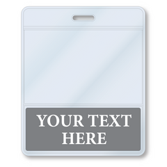 A Custom Printed BadgeBottoms® Horizontal (Badge Holder & Badge Buddy IN ONE) with a transparent upper section and a grey lower section featuring the placeholder text "YOUR TEXT HERE." The badge has a slot at the top, likely for attaching a lanyard. This customizable title area ensures you can personalize it to fit your specific needs.
