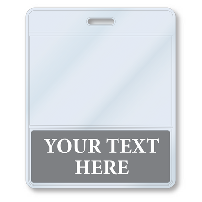 A Custom Printed BadgeBottoms® Horizontal (Badge Holder & Badge Buddy IN ONE) with a transparent upper section and a grey lower section featuring the placeholder text "YOUR TEXT HERE." The badge has a slot at the top, likely for attaching a lanyard. This customizable title area ensures you can personalize it to fit your specific needs.