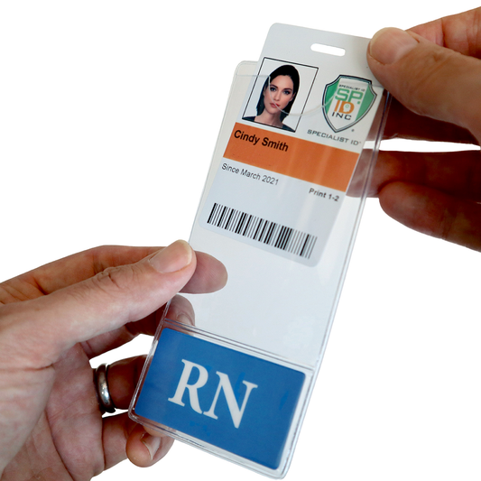 A person holding an RN BadgeBottom Badge Holder & Badge Buddy IN ONE!! - Vertical ID Badge Sleeve with Bottom Role Tag for Registered Nurses for Cindy Smith, an RN, indicating her position since March 2021.