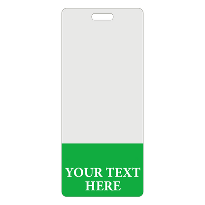 A Custom Printed Clear Badge Buddies Vertical (Standard Size) - Customize with Title and Color featuring a blank vertical rectangle with a green section at the bottom displaying the text "Your Text Here" for instant role recognition.