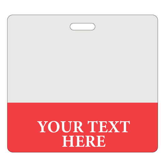 A rectangular badge with a white top half and red bottom half displaying the text "Your Text Here" in white capital letters. A slot at the top for attaching a clip or lanyard, perfect for Custom Printed Clear Badge Buddies Horizontal (Standard Size) - Customize with Title and Color.
